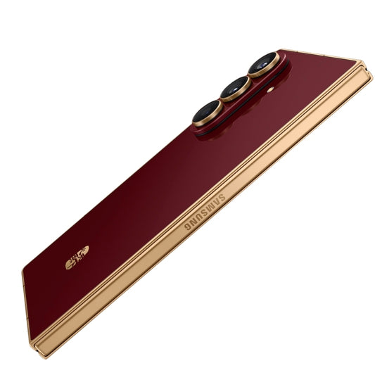 Samsung smartphone with red back and gold edges on a white background